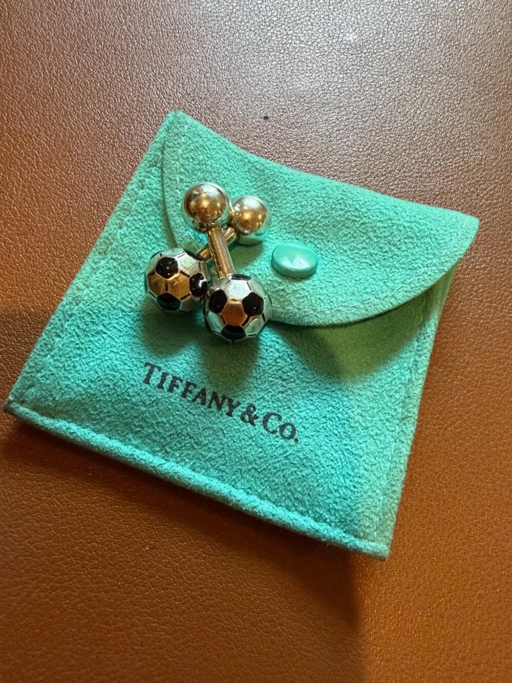 Tiffany sterling silver vintage soccer ball cufflinks with black enamel accents.